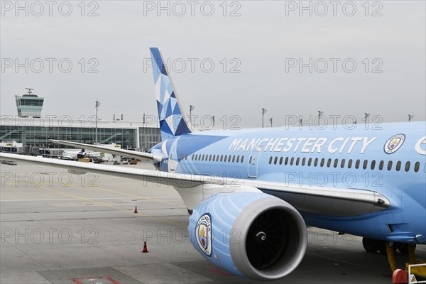 Etihad Boeing B777-9 Dreamliner special livery Manchester City on position at Terminal 2