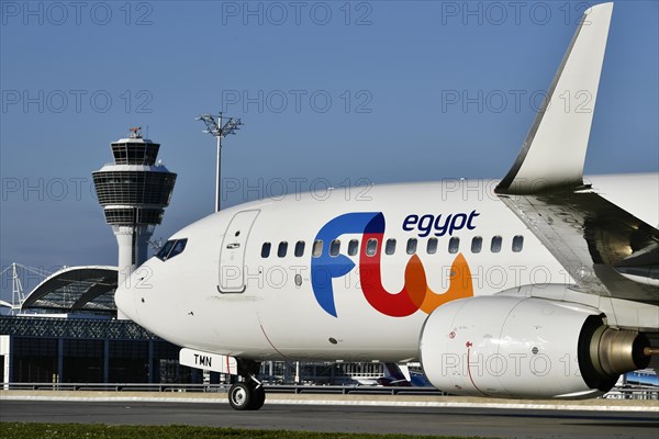 Egypt Boeing B737 taxiing in front of Terminal 1 with tower