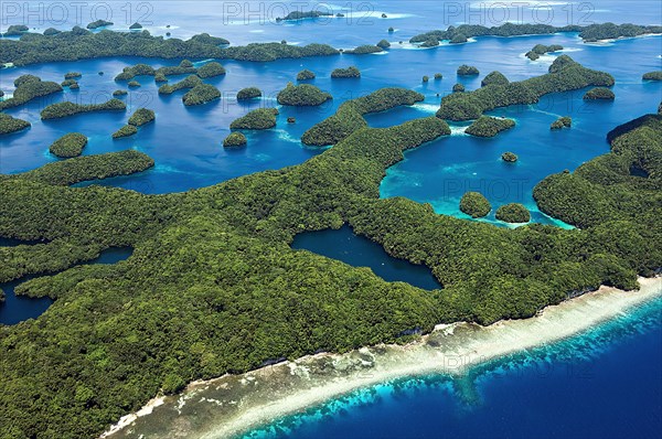 Aerial view of small tropical archipelago many small tropical green overgrown islands