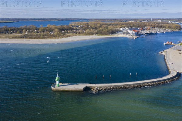 Aerial view over harbour entrance with lighthouse Travemuende Nordmole