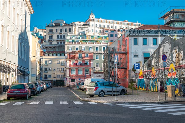 Old houses in narrow alleys and historic streets. Old house fronts in the morning and in the sunshine with reflection