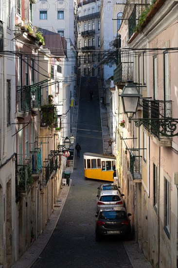 Old houses in narrow alleys and historic streets. Old house fronts in the morning and in the sunshine