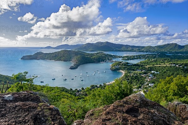 Aerial view over sailing boats and yachts anchored in the English Harbour and Falmouth Harbour bays on the south coast of Antigua island