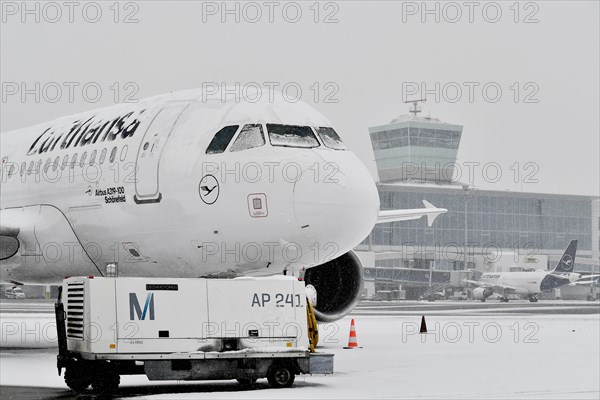 Snowed-in Lufthansa Airbus in winter