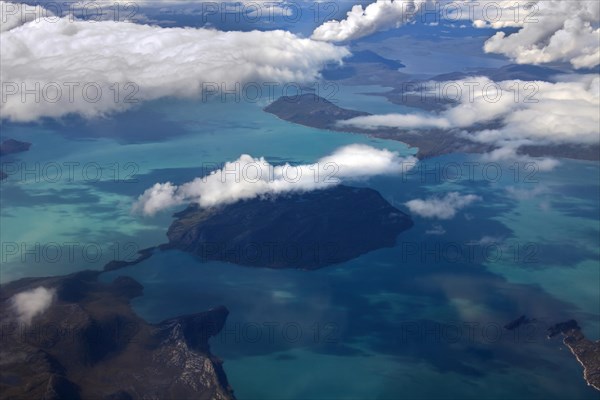 Aerial view over West-Greenland showing sea and islands