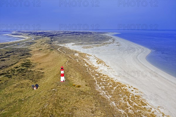 Red and white striped lighthouse List East