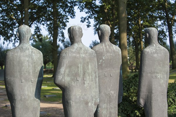 Sculpture group Trauernde Soldaten by Emil Krieger at the First World War One military cemetery Deutscher Soldatenfriedhof Langemark