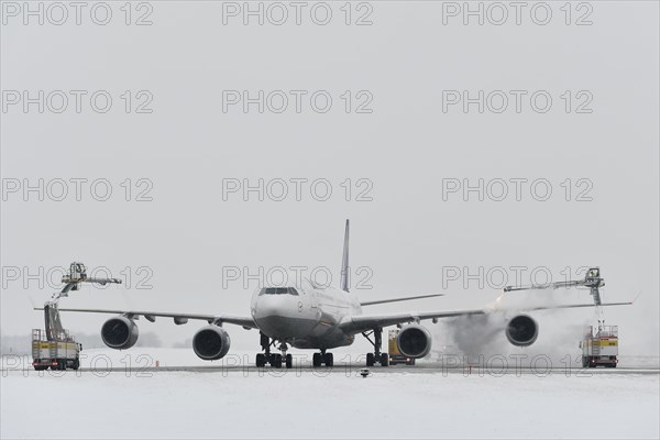 Aircraft deicing in winter in front of take-off