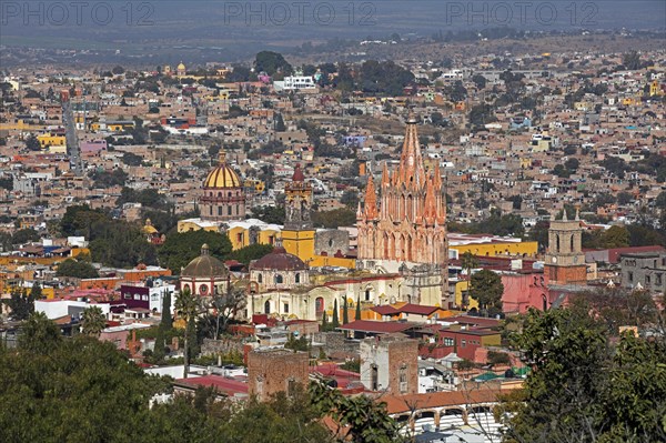 Aerial view over the city San Miguel de Allende and its neo-Gothic parish church La Parroquia de San Miguel Arcangel