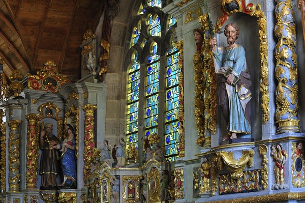 Altar and Baroque retable of the chapel at Sainte-Marie-du-Menez-Hom