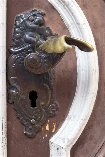 Old door handle on a historic house