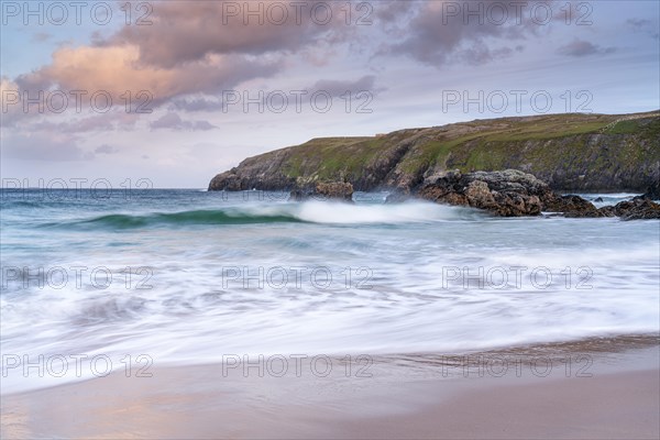 Rocks with sandy beach in Sango Sands Bay