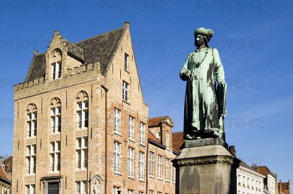Statue of Northern Renaissance artist Jan Van Eyck in the city Bruges