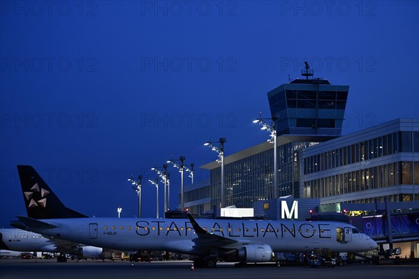 Star Allianz Embraer ERJ-195 in position in front of satellite