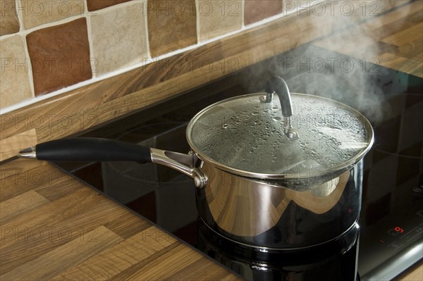Stainless steel saucepan of boiling water