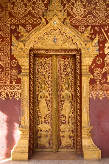 Wat Saens decorated entrance door in Luang Prabang