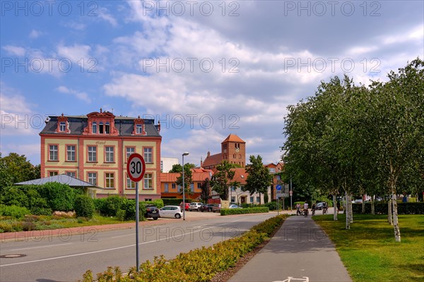 Town view with the Harmonie Hotel and the Georgenkirche in the historic town centre of Waren an der Mueritz