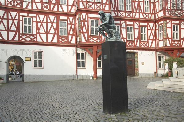 Sculpture The Thinker by Auguste Rodin 1880 in front of the Adelsheimer Hof