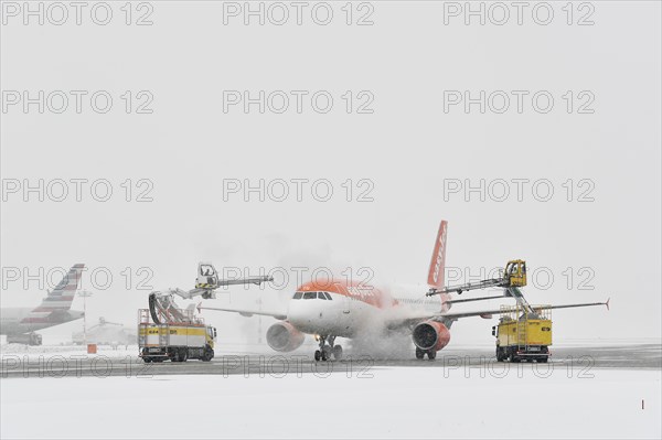 Aircraft de-icing in winter in front of take-off