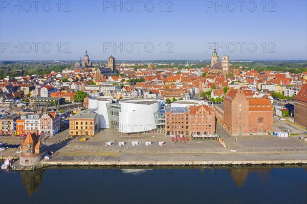 Aerial view over waterfront and public aquarium Ozeaneum in harbour of the Hanseatic City of Stralsund in summer