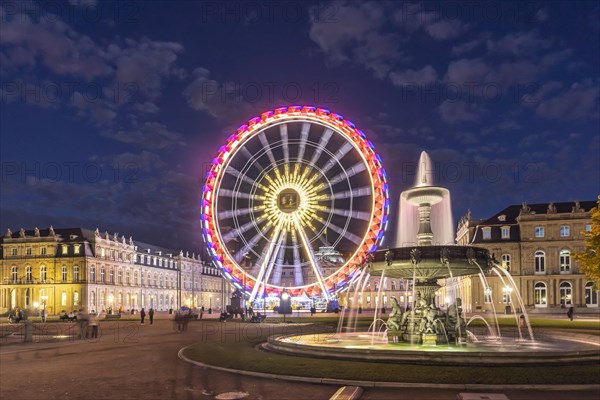 Ferris wheel in the courtyard of honour of the New Palace at night