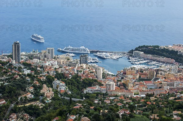 Aerial view over the city and cruise ships in the port of Monte Carlo
