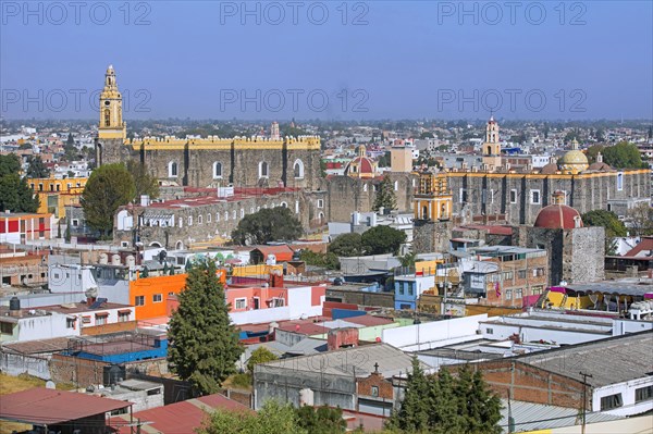 Aerial view over the city Cholula and the 16th century San Gabriel Franciscan Convent