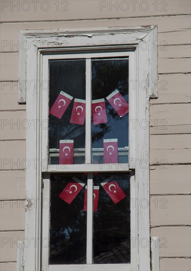 Turkish national flag hang in view in open air