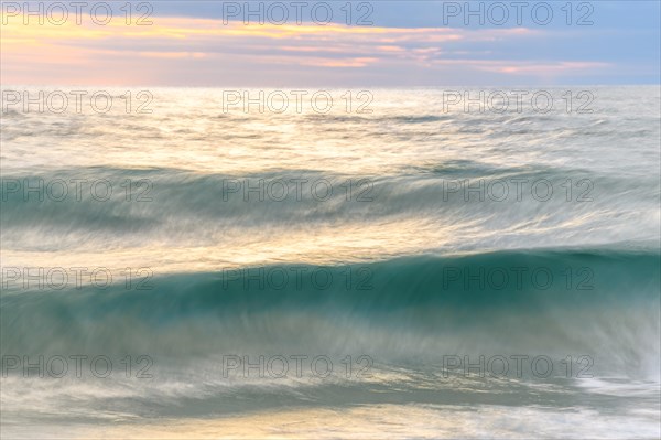 Wave crash on a sandy beach in the Atlantic Ocean. Sables dOlonne, Vendee, Pays-de-la-Loire, France, Europe