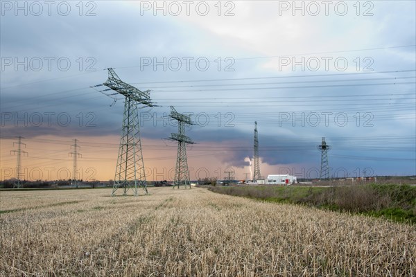 Thunderstorm cell with lightning, power pylons at Wolmirstedt substation, starting point for the southeast link, Wolmirstedt, Saxony-Anhalt, Germany, Europe