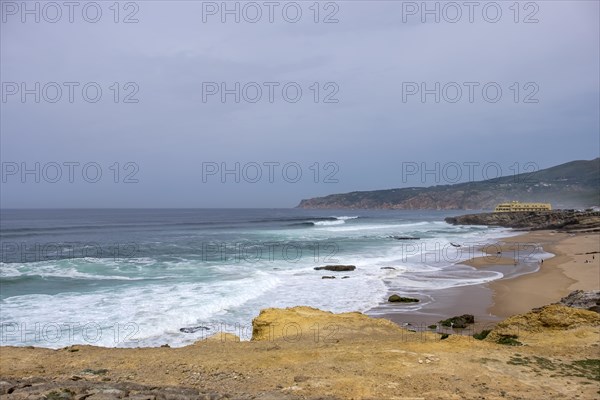 Praia da Cresmina, in the background Fortaleza do Guincho, today a 5 star hotel, near Cascais Portugal