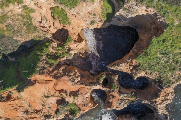 Caves at Praia da Marinha, rocks and cliffs, steep coast in the Algarve, Portugal, Europe