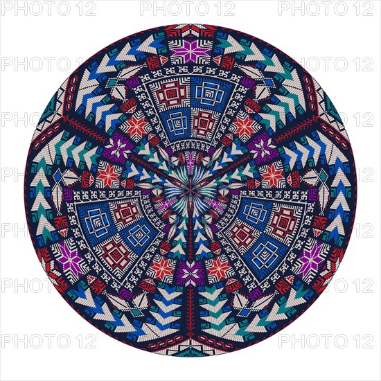 Decorative round Palestinian Tatreez design element over white background, vector illustration