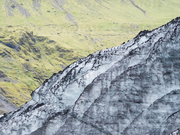 Glacier at Solheimajoekull glacier lagoon, Solheimajoekull, glacier tongue of Myrdalsjoekull with inclusion of volcanic ash, near Ring Road, Suourland, South Iceland, Iceland, Europe