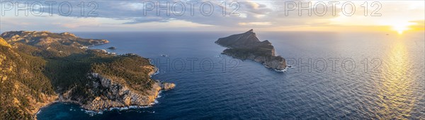 Rocky coast with an island, Sunset over the ocean, Mirador Jose Sastre, Sa Dragenora Island, Mallorca, Spain, Europe