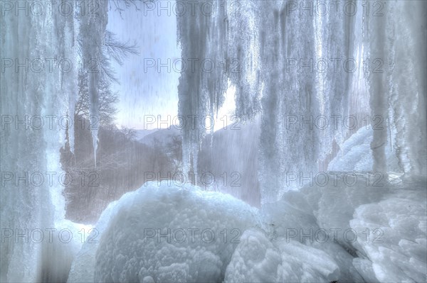 Icicles at the waterfall, permafrost with icy landscape, Swabian Alb, Bad Urach, Baden-Wuerttemberg, Germany, Europe