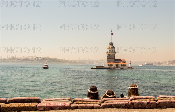 People towards Maidens Tower located in the middle of Bosporus