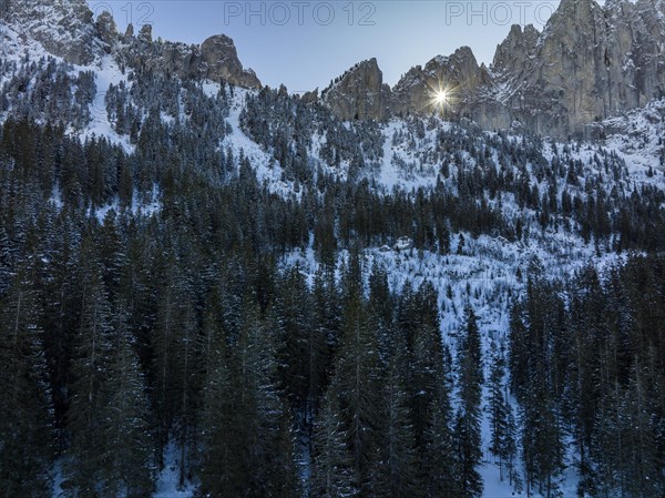 Sun shining through grandmother hole, drone image, erosion gap in the saddle peaks, Fribourg Alps, Jaun, Fribourg, Switzerland, Europe