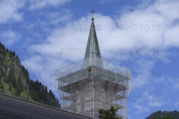 Scaffolded steeple of the St. Johannes Baptist Church, Bad hindelang, Allgaeu, Bavaria, Germany, Europe