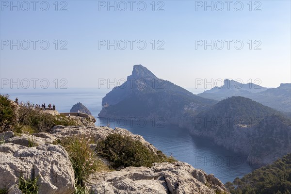 Tourists at the viewpoint Mirador des Colomer, Tramuntana Mountains, Majorca, Balearic Islands, Spain, Europe