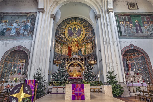 Christmas decorated high altar, neo-Romanesque parish church of St. Anne in Lehel, Munich, Bavaria, Germany, Europe