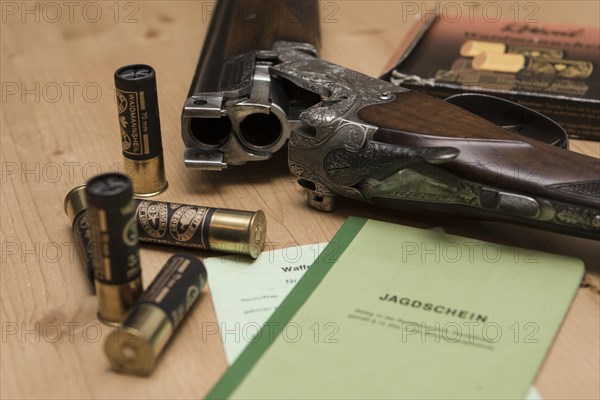 Decorated hunting weapons with ammunition, hunting license and gun ownership card and, Hesse, Germany, Europe