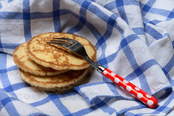 Blini, blinis on kitchen towel, mini pancakes