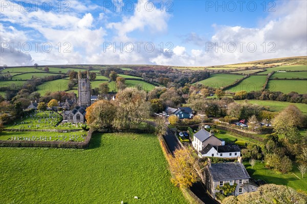 St Pancras Church in Widecombe in the Moor from a drone, Haytor Rocks, Dartmoor National Park, Devon, England, United Kingdom, Europe