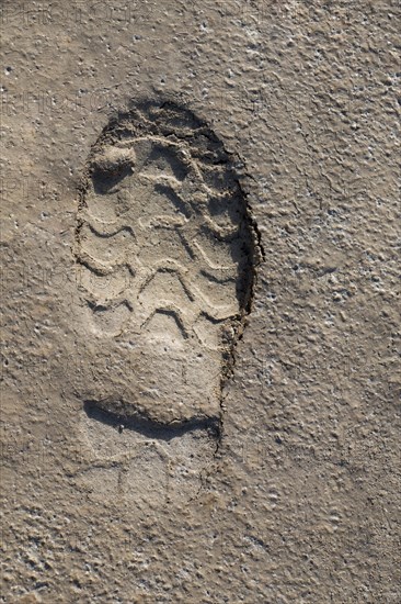 Footstep pattern seen on a concrete background