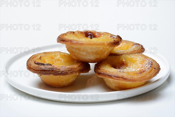 Pastel de Nata, Pasteis de Nata on a plate, custard tart, Portuguese speciality