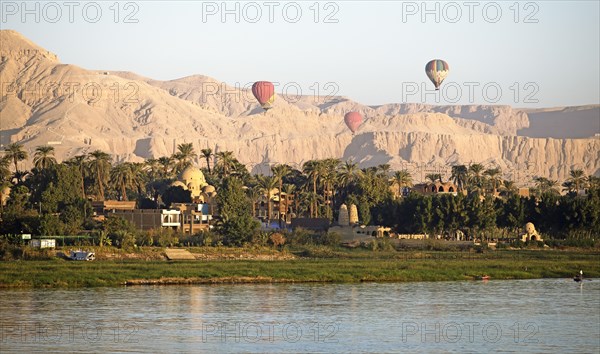 Hot air balloons in Luxor, Eastern Desert behind, Egypt, Africa