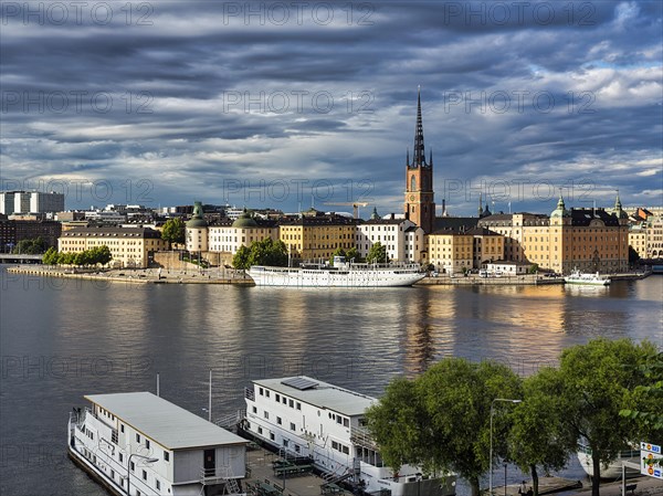 View from the viewpoint Monteliusvaegen to the island Riddarholmen, old town Gamla Stan, evening light, Stockholm, Maelaren, Sweden, Europe