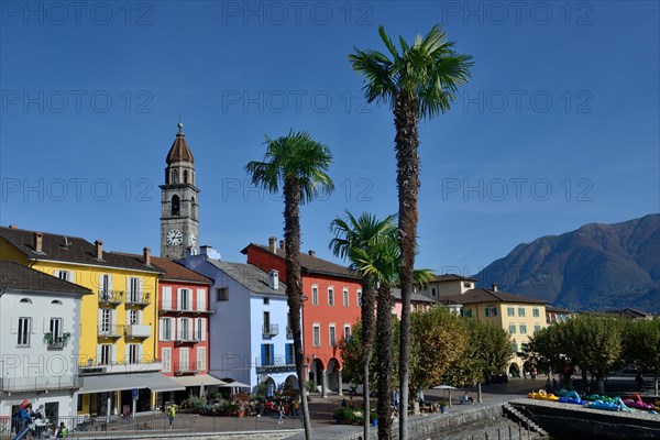 Lake promenade in Ascona with church Santi Pietro e Paolo, Lungolago, Canton Ticino, Switzerland, Europe