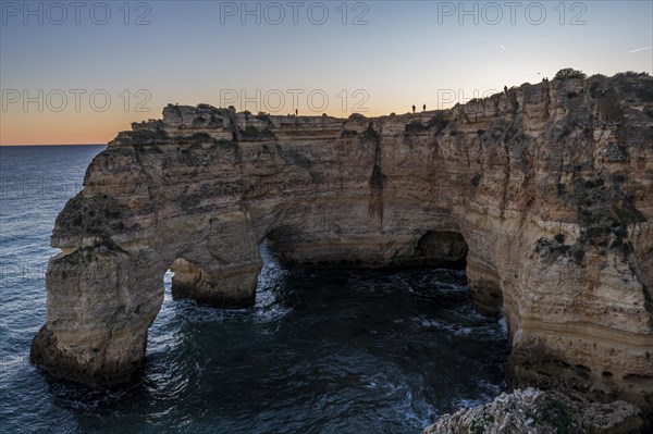 Sunset at Praia da Marinha, rocks and cliffs, steep coast in the Algarve, Portugal, Europe